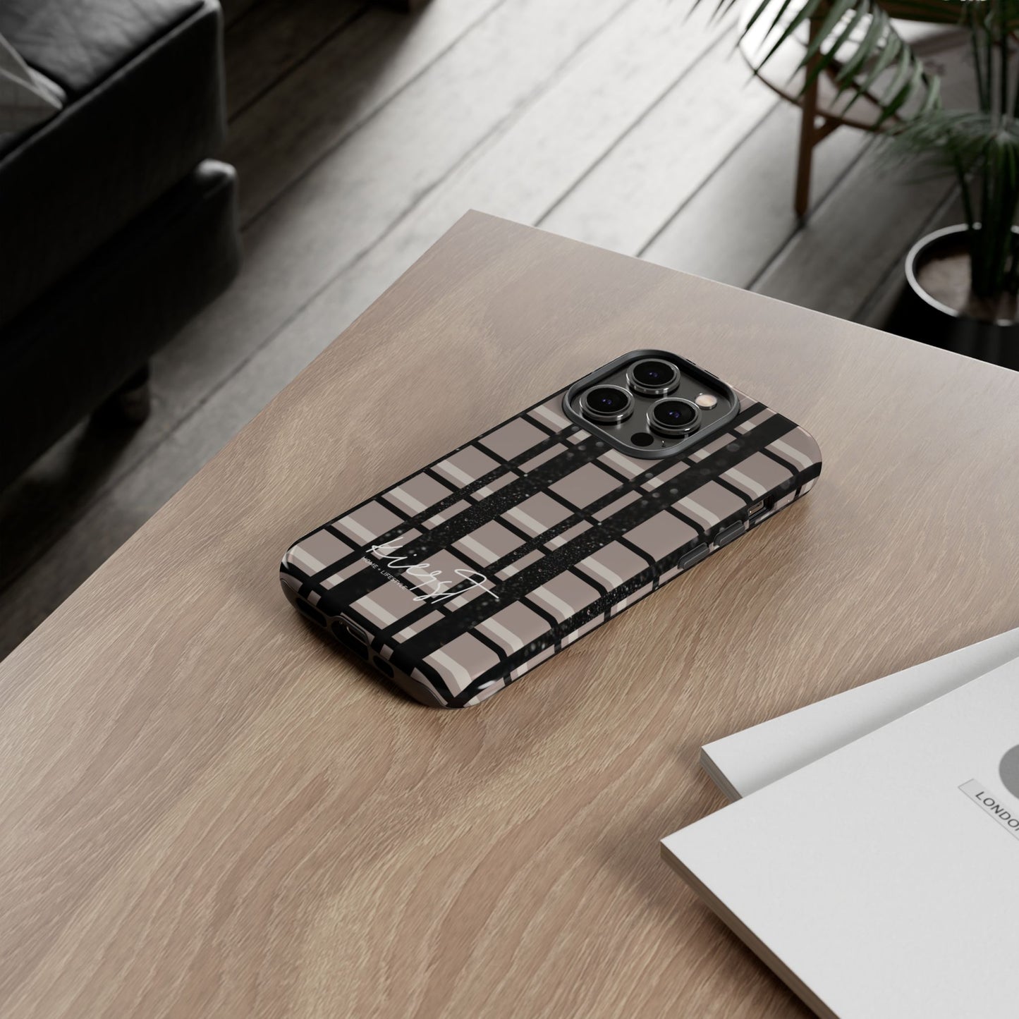 Phone case with grid pattern on a wooden table